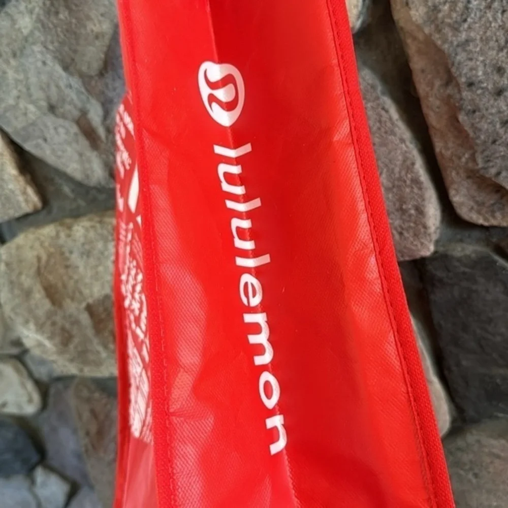 Lululemon Athletica red large reusable plastic‎ coated shopping bag